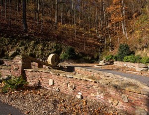 Undulating wall near one of our log house plans