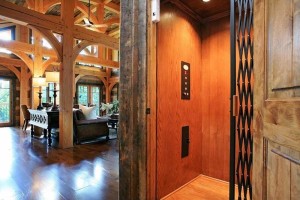 Elevator and living space in one of our log cabin plans