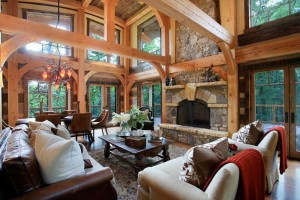 Sunlit living room in one of our log home plans