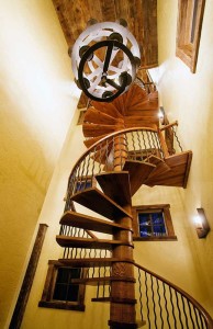 Spiral staircase in the tower of one of our log cabin designs