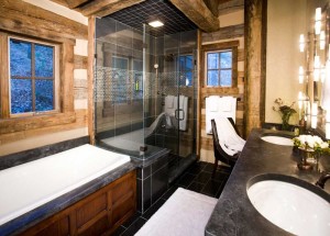 Shower, tub, and sink in one of our log house plans